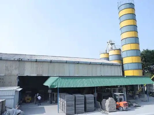 An Ashtech Group fly ash processing plant with storage silos