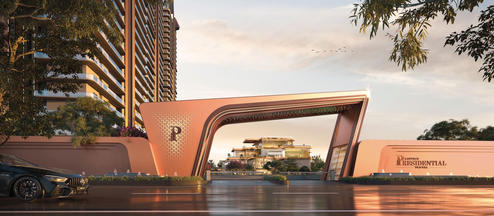 The illuminated entrance gateway of Ashtech Presidential Towers at golden hour, Sector 12 Greater Noida West