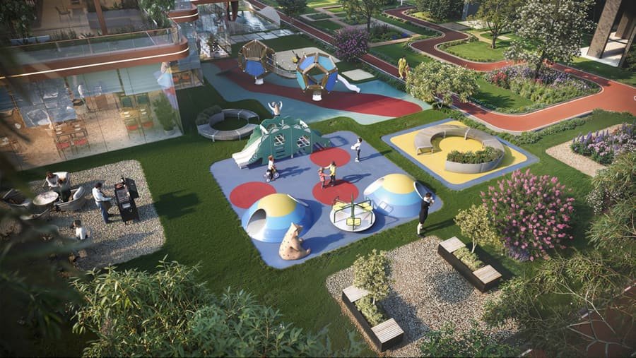 Landscaped kids' play area with play structures and a jogging track at Ashtech Presidential Towers